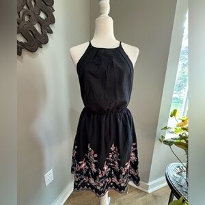 Sleeveless black cotton dress, embroidered flower details. Size Med. New w/tags